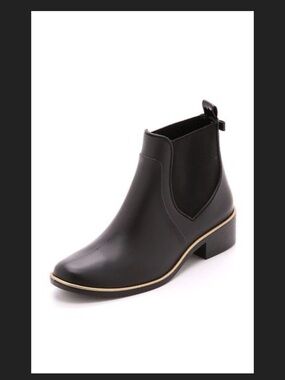 kate spade Black Chelsea Booties with Gold Accent